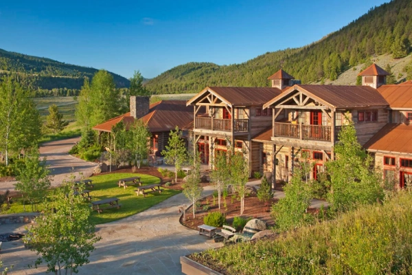 The Ranch at Rock Creek in Montana with meadows, mountains, and rustic lodges.